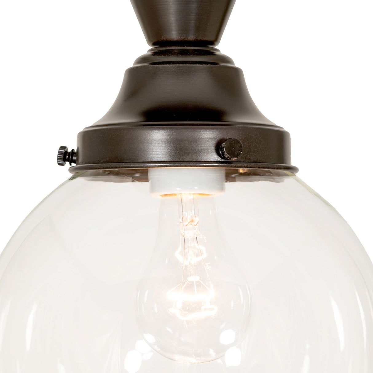 Close-up of the Revival Schoolhouse fixture highlighting the globe.