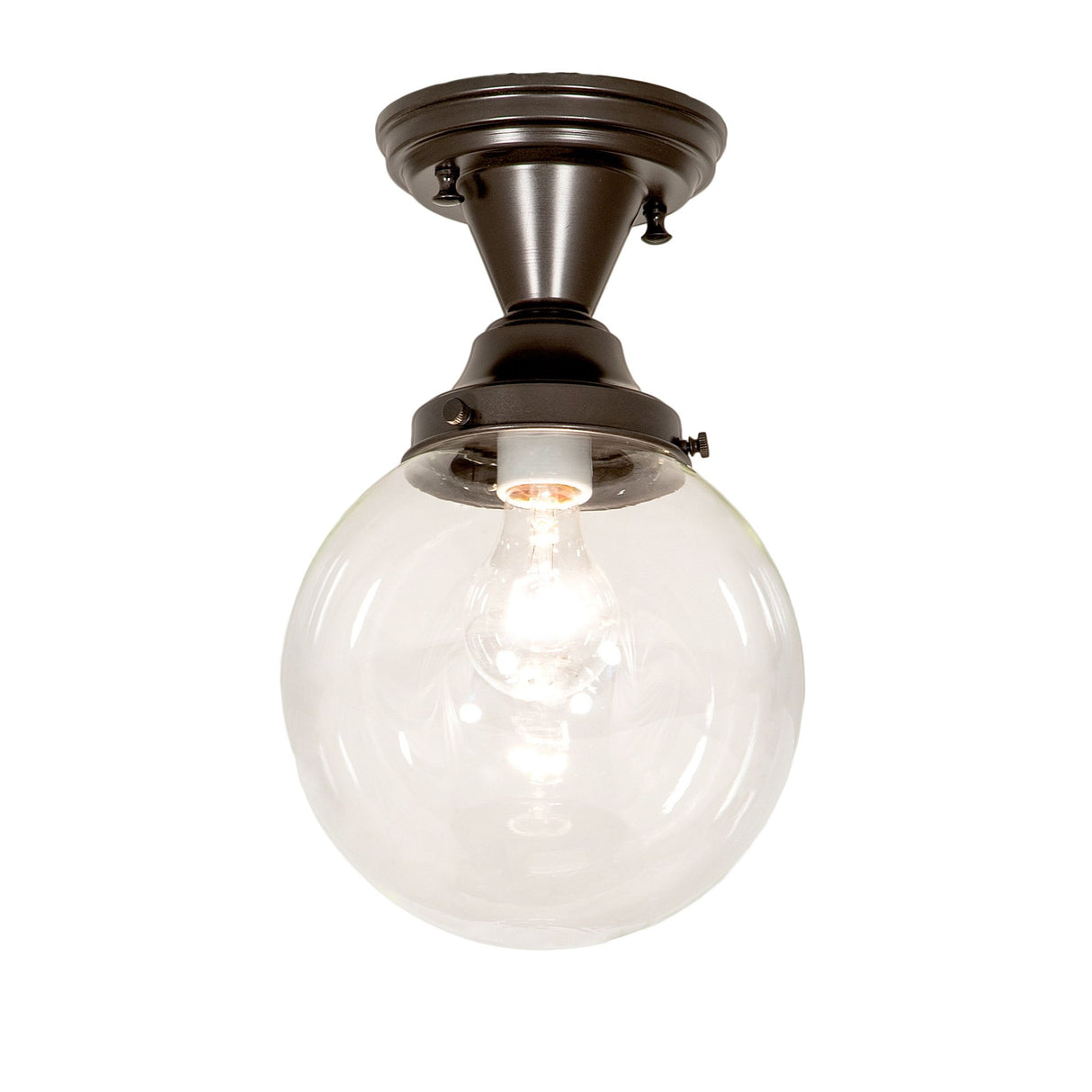 Illuminated Revival Schoolhouse semi-flushmount with clear glass globe.