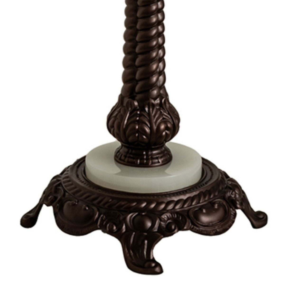 Close-up of lamp base featuring detailed rope design and decorative feet.