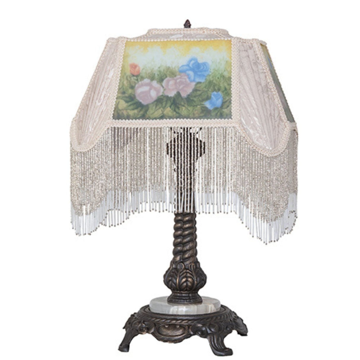 Elegant table lamp with rose-painted shade and decorative trim.