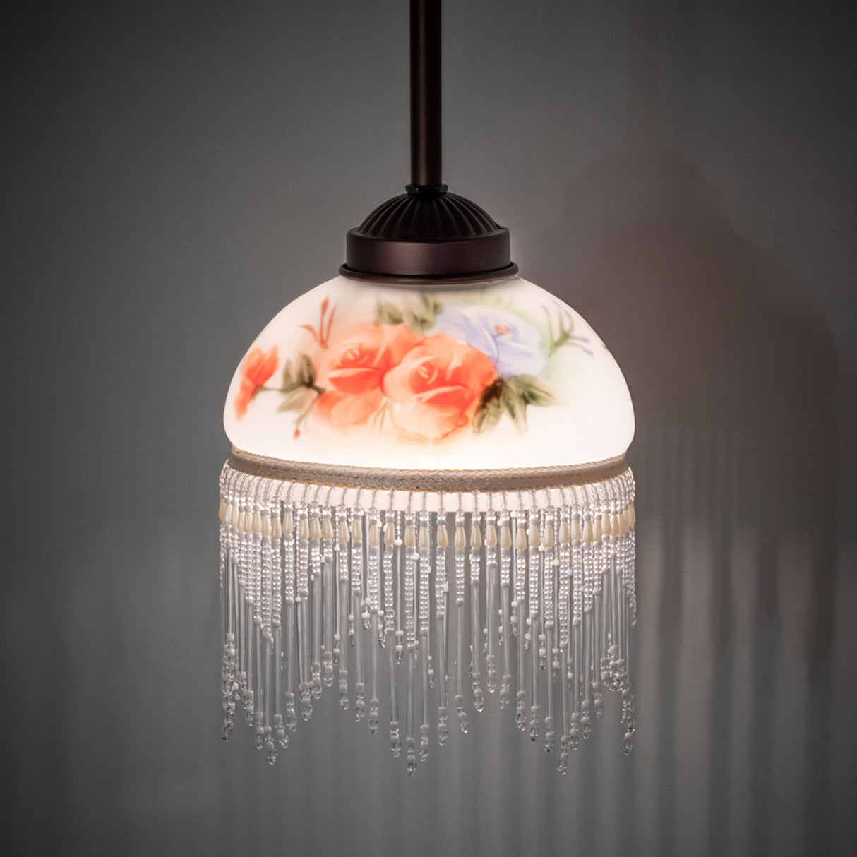 Ambiance view of Roussillon mini pendant with floral shade and fringe.