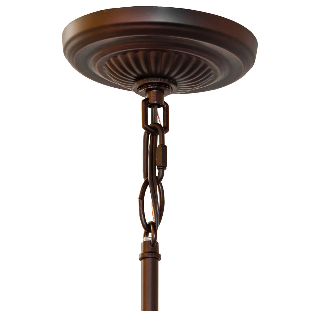 Closeup view of canopy and chain of mini pendant in bronze finish.