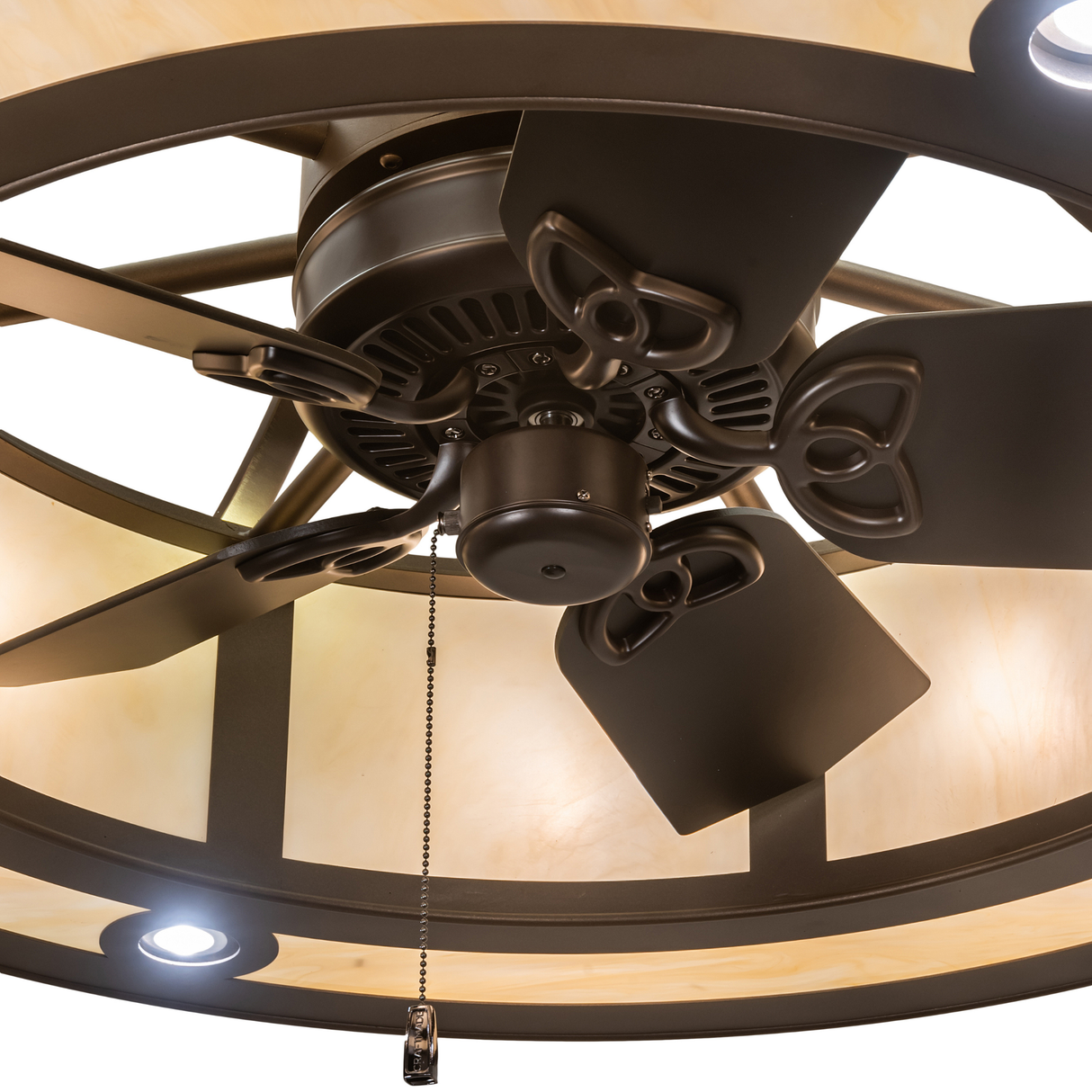 Closeup of Sargent Chandel-Air fan hub and pull chain detail under soft glow.