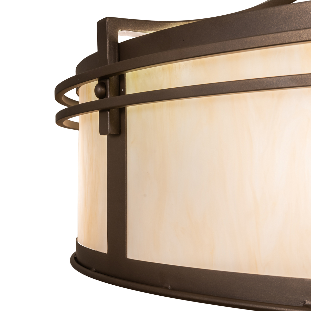 Closeup of metal frame corner showing craftsmanship and bronze finish texture.