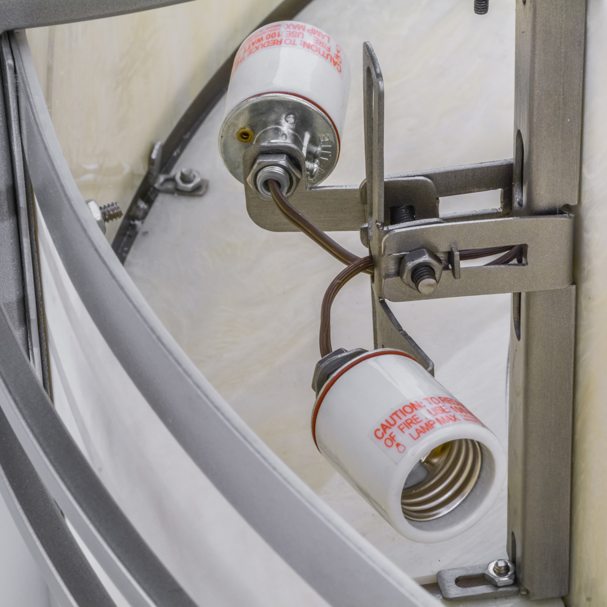 Internal socket closeup showing bulb holder and wiring assembly.