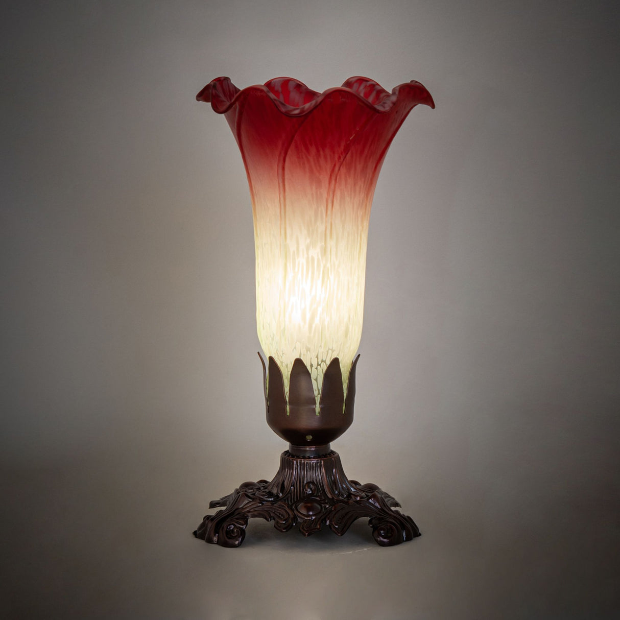 Ambient lighting view of the Cranberry Victorian Accent Lamp, casting a soft glow.