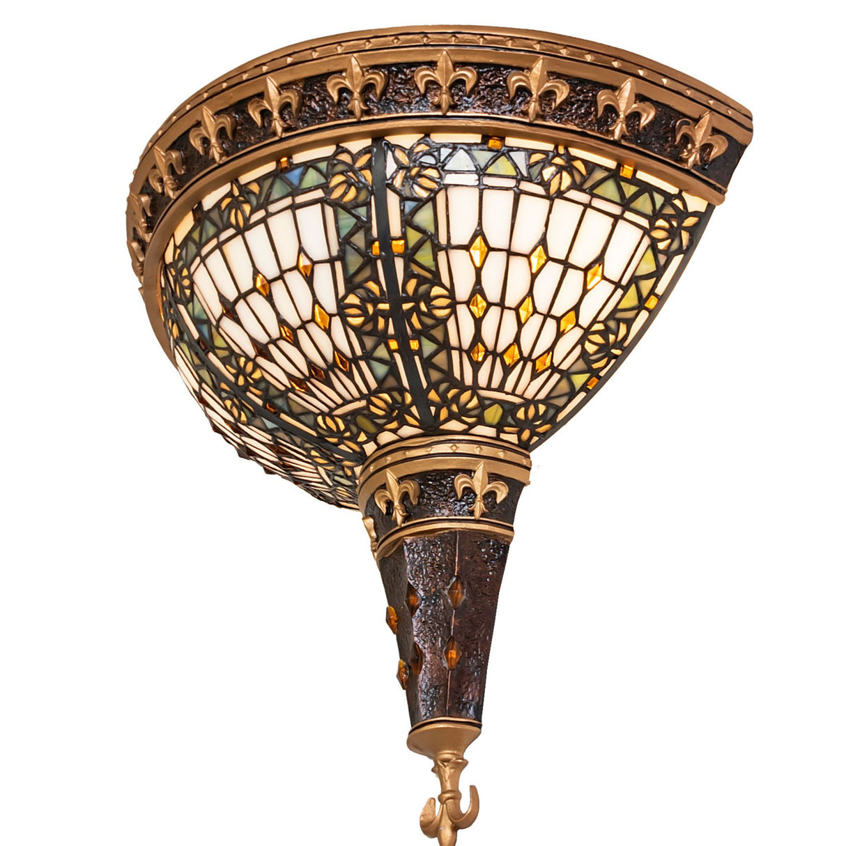 Side perspective of the illuminated Fleur-de-lis wall sconce with golden accents.