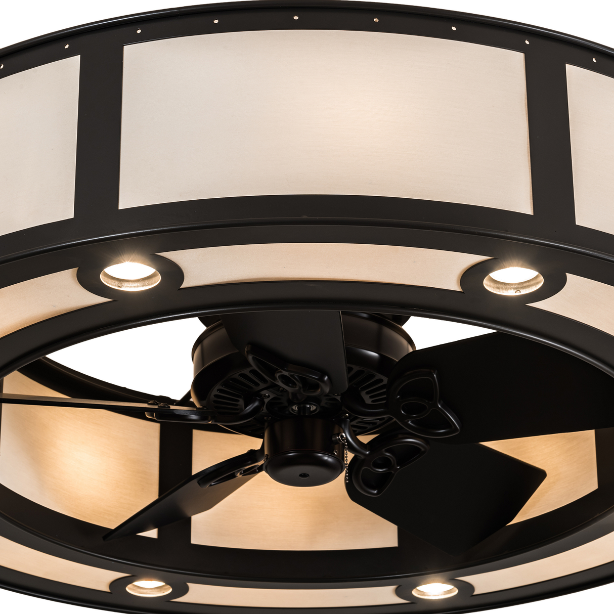 Close-up of Smythe Craftsman Chandel-Air fan and bronze detailing.