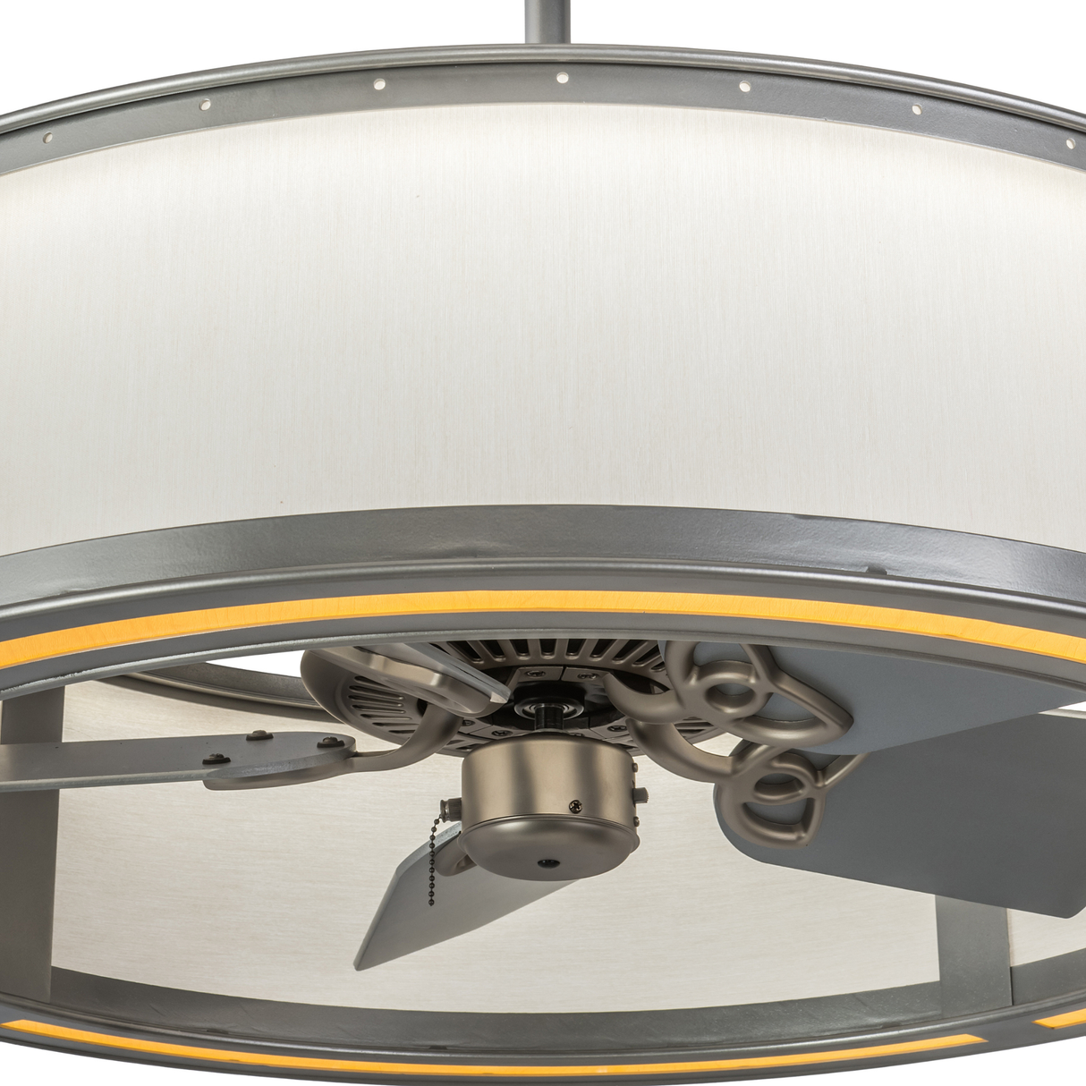 Close-up showing fan motor and subtle metallic accents within drum frame.