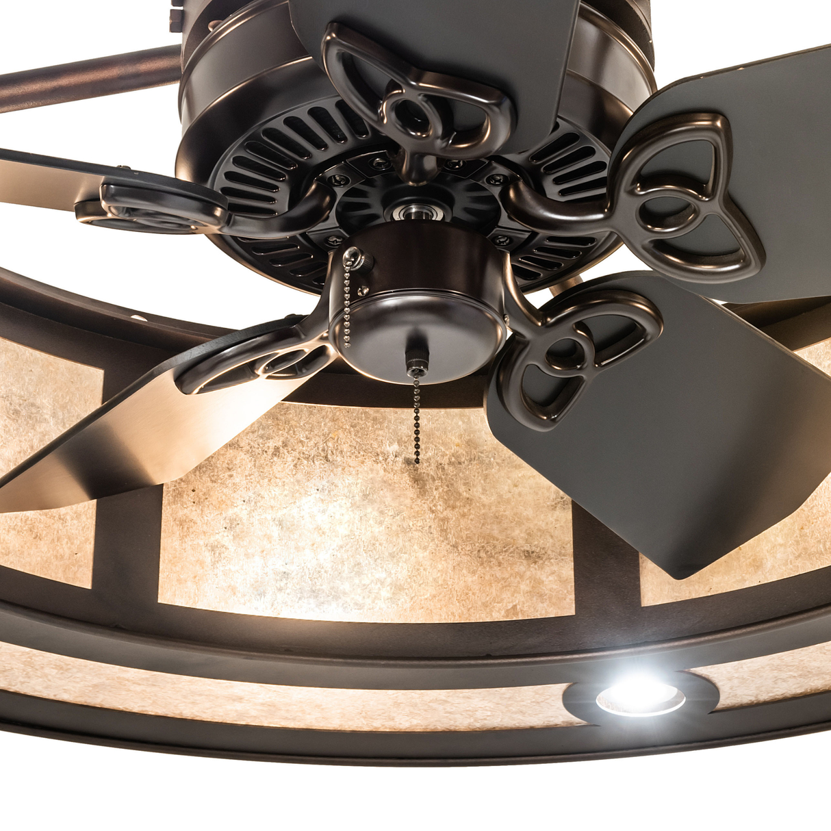Close-up of detailed bronze fan blades and motor housing.