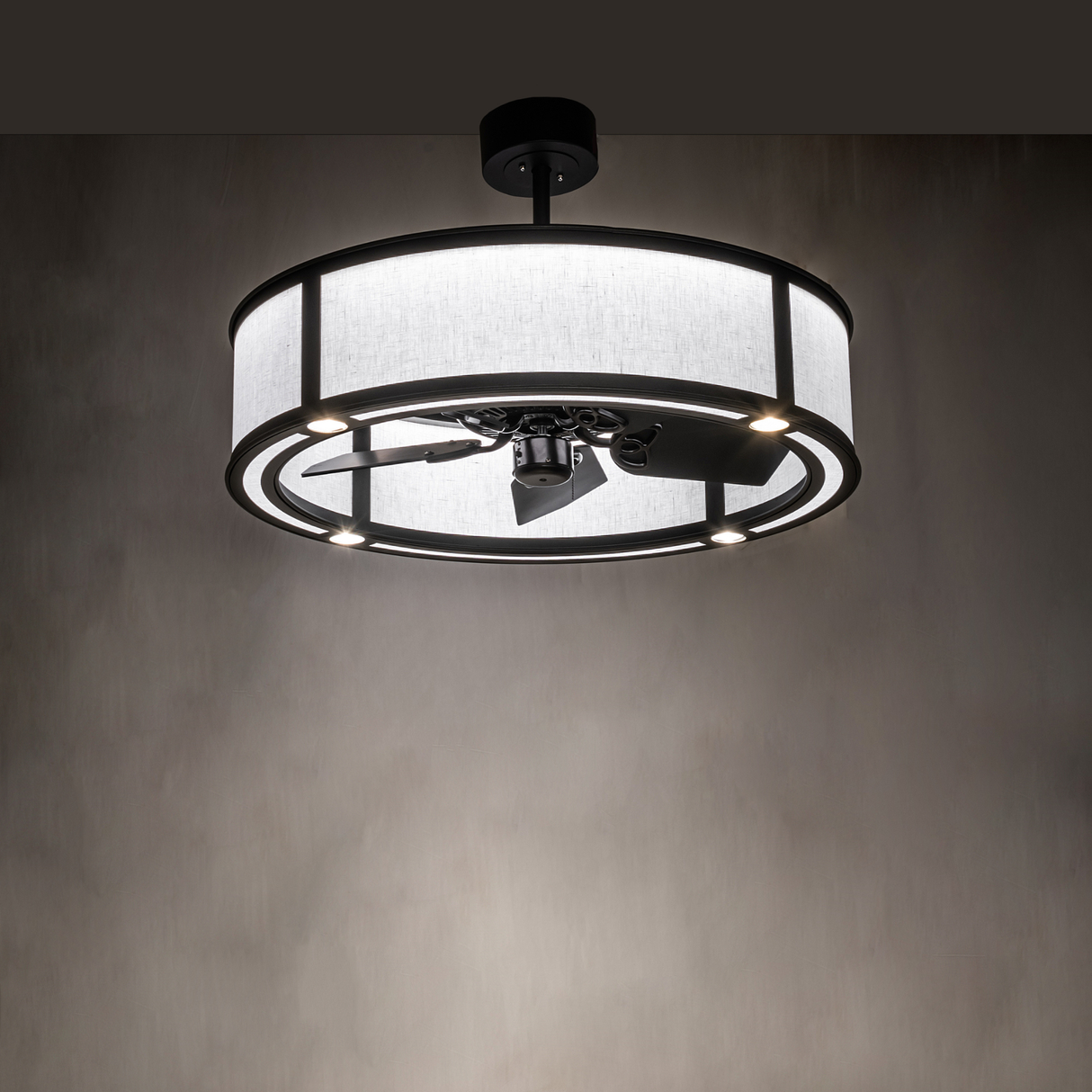 Smythe Craftsman Chandel-Air softly illuminating a modern interior setting.