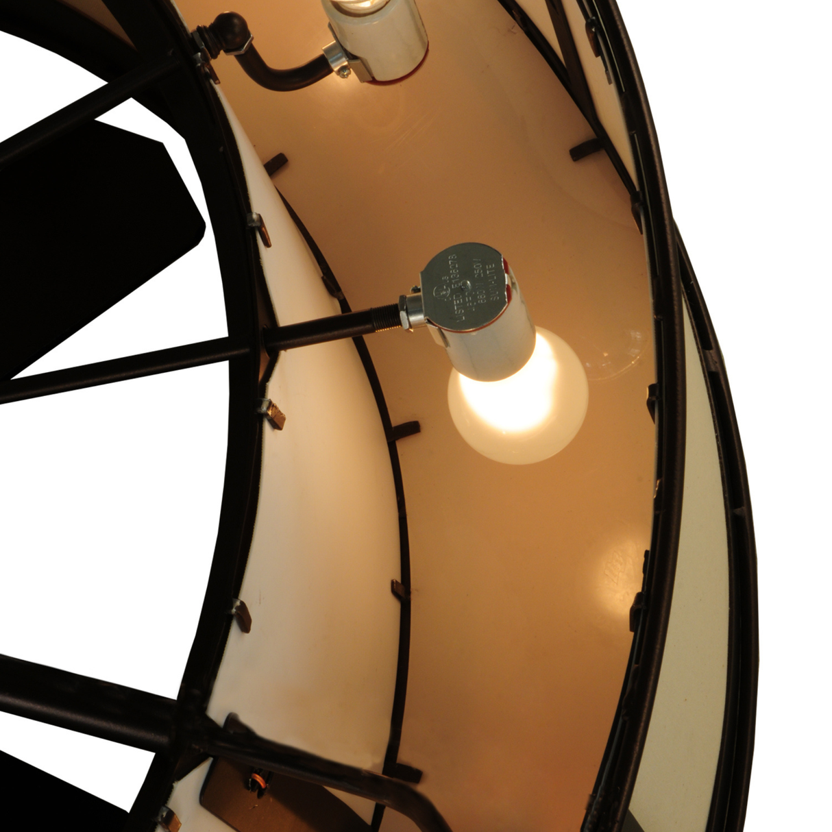 Close-up of inner bulb detail and bronze frame interior.