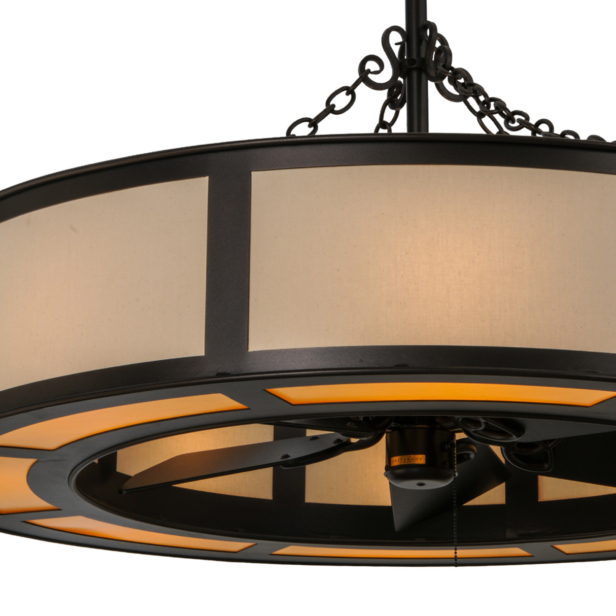 Closeup detail showing warm amber diffuser and black metal accents.