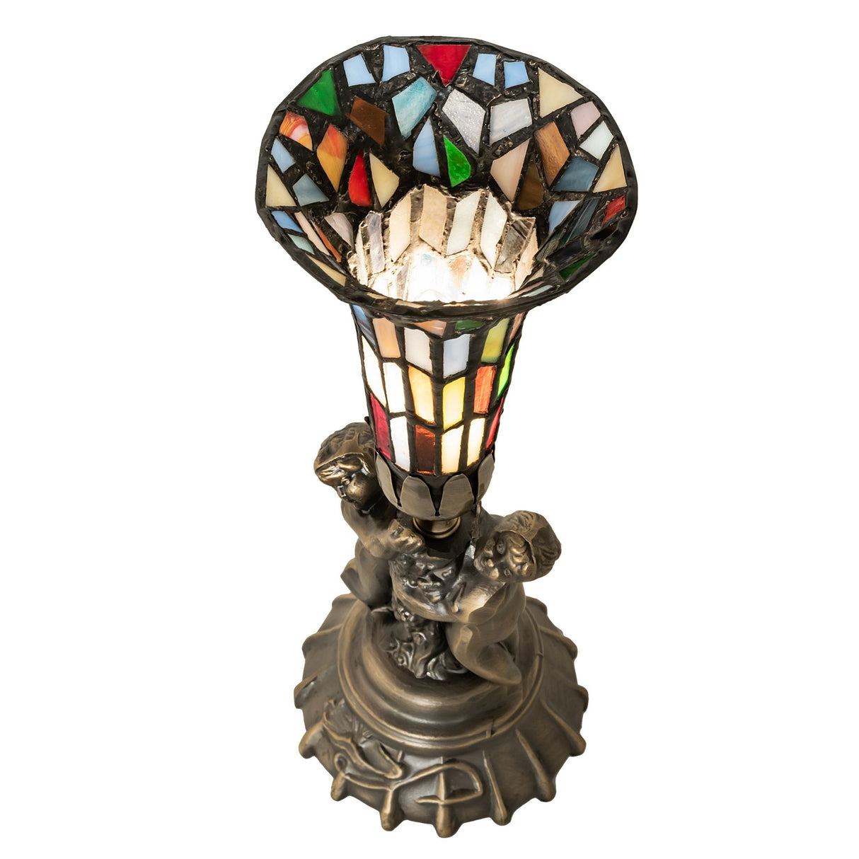 Overhead view of stained glass lily lamp with warm glow.