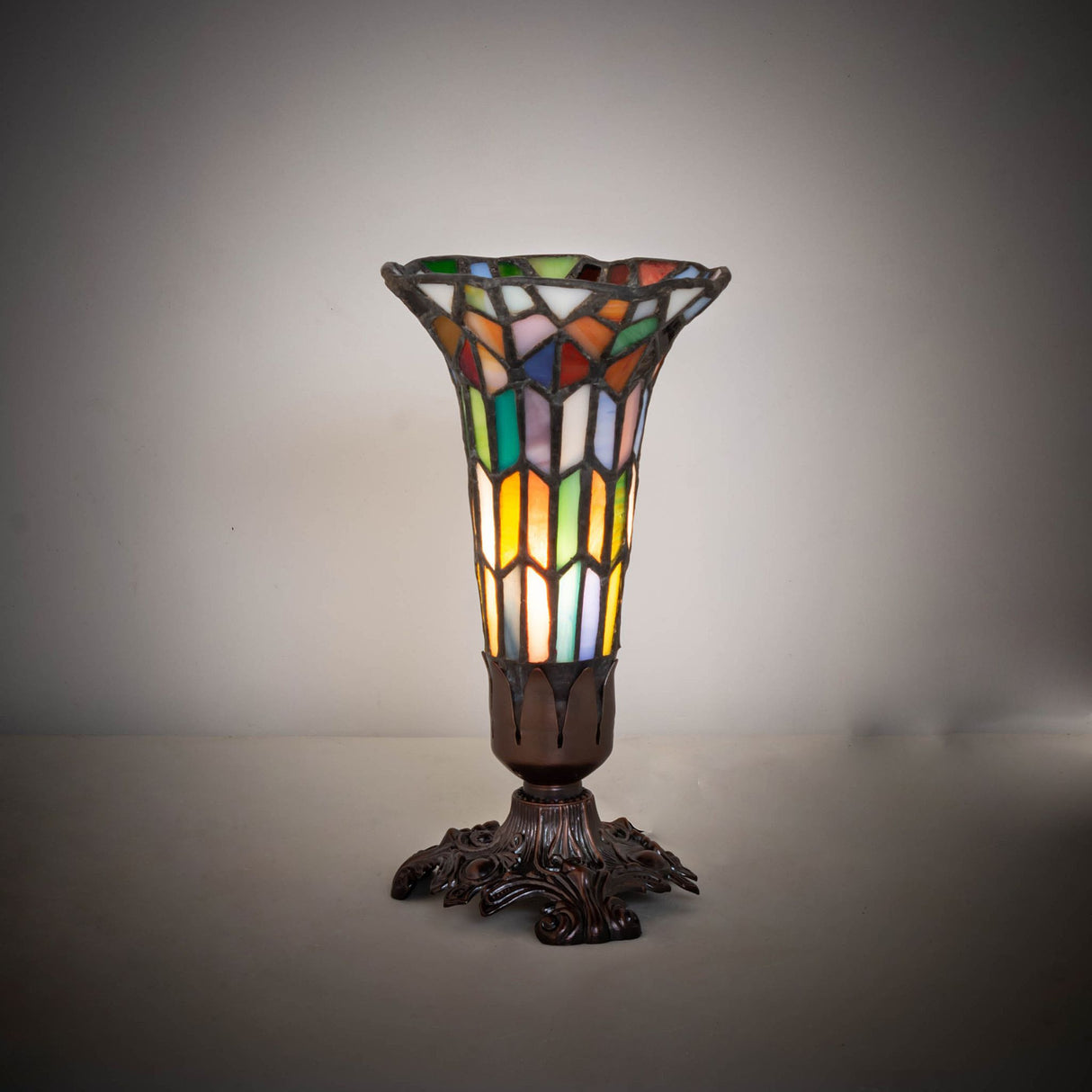 Illuminated stained glass Pond Lily accent lamp showcasing vibrant hues in a Tiffany-style design.