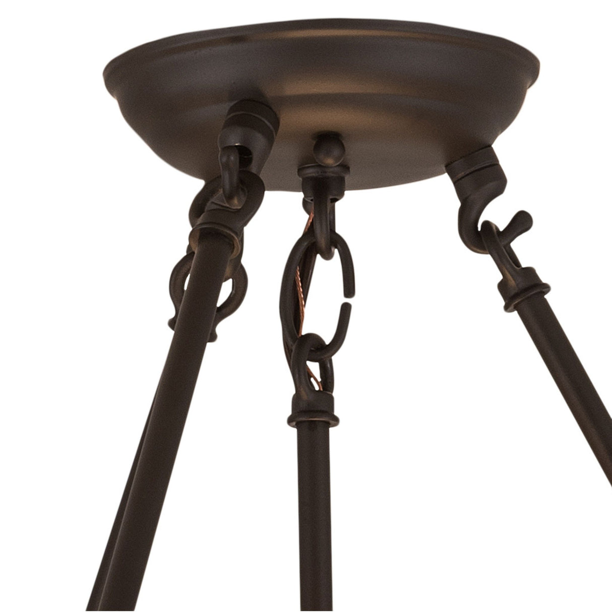 Detailed view of the pendant’s ceiling mount with bronze finish.