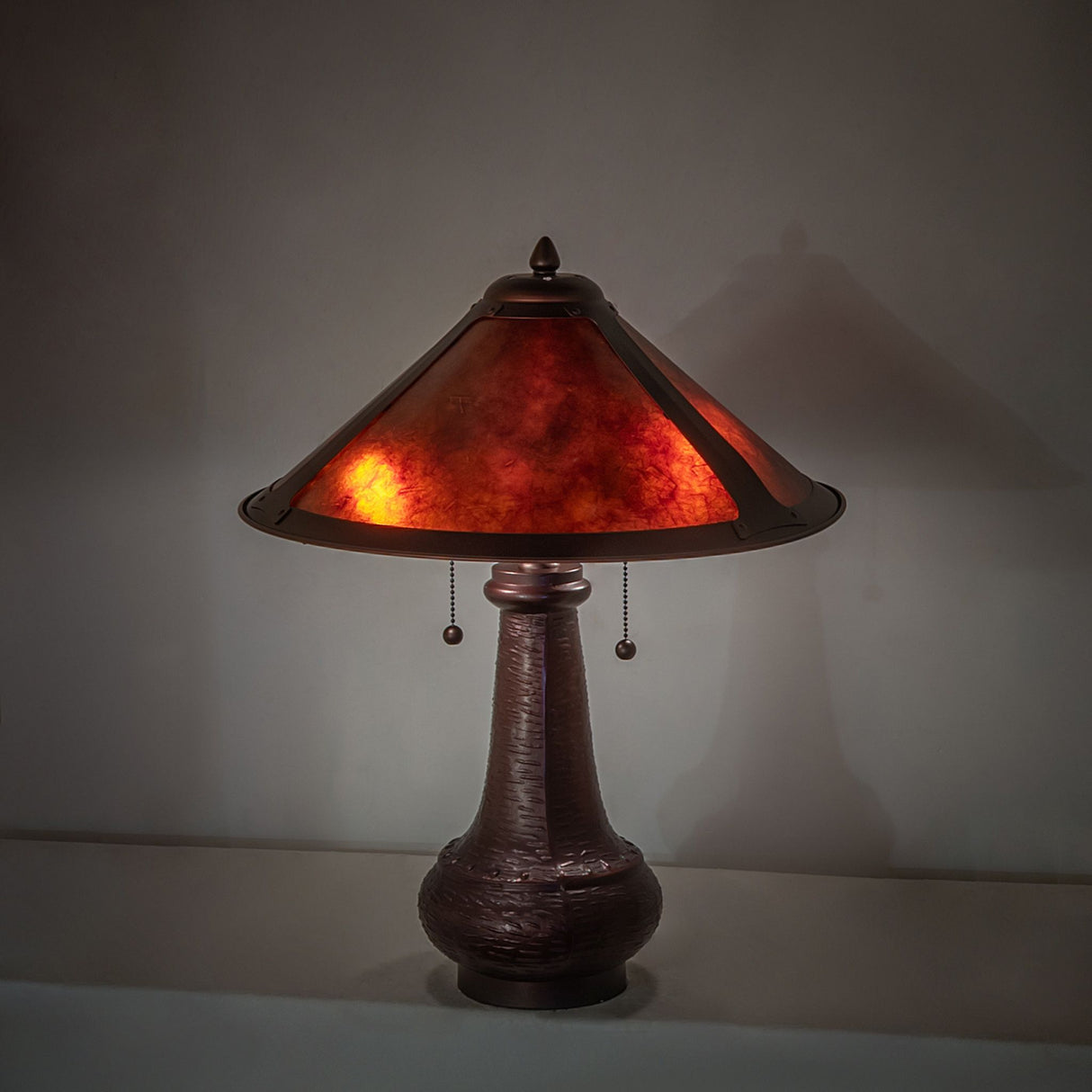 Ambient lighting effect from Sutter table lamp's amber mica shade.
