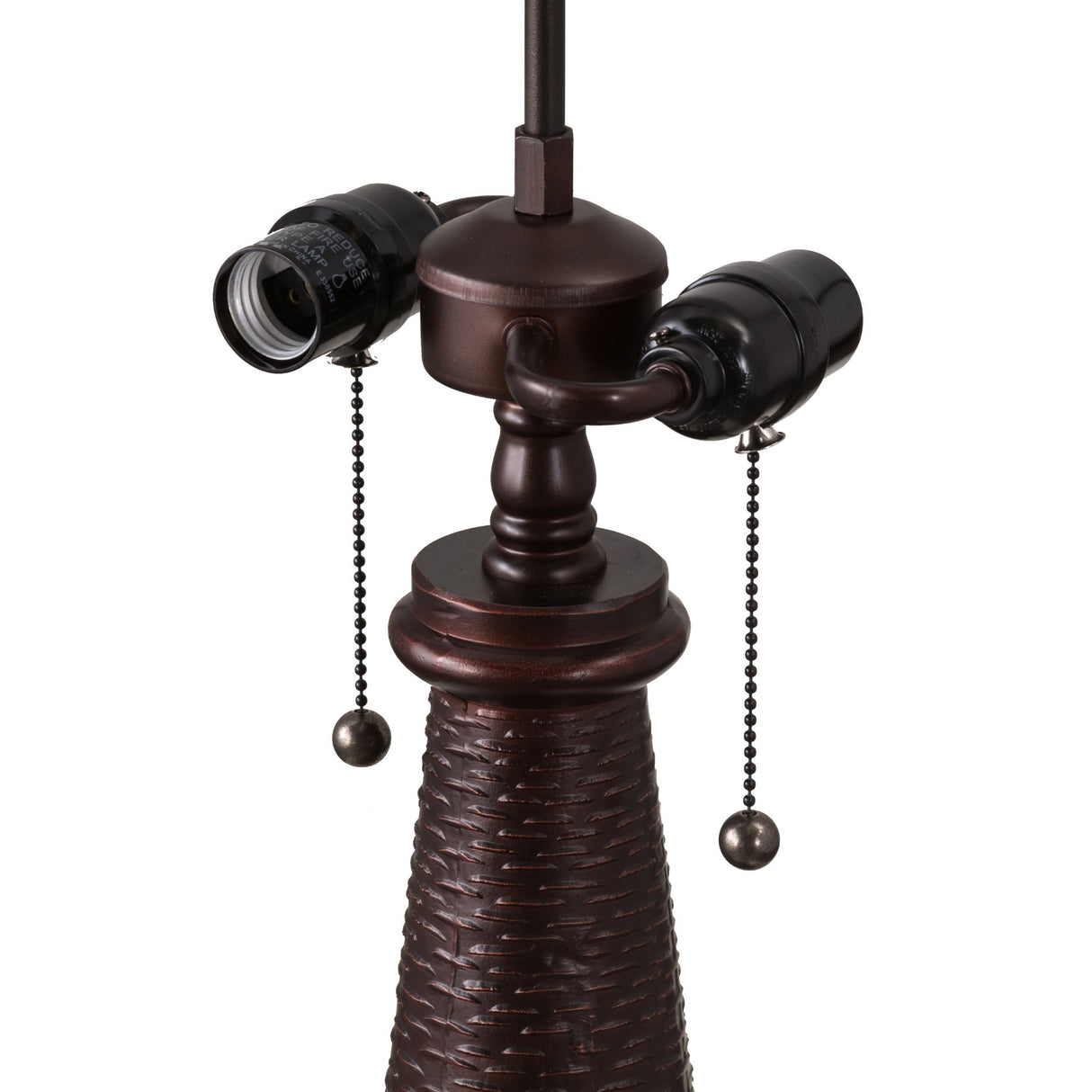 Close-up of Sutter table lamp dual sockets and pull chains.