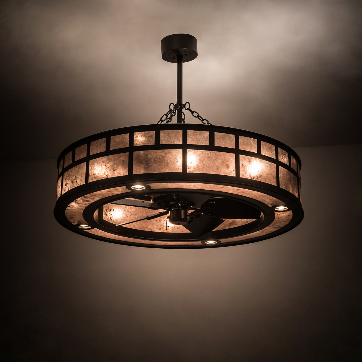 Lit “T” Mission Chandel-Air glowing softly in ambient room light.