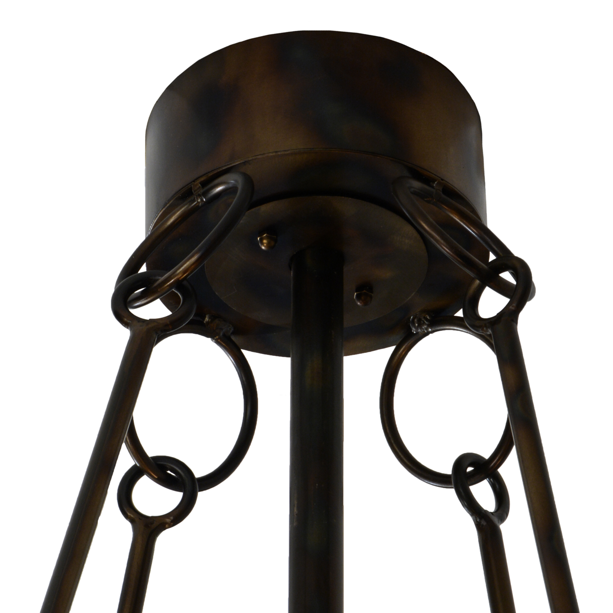 Closeup of ceiling canopy and hanging rings in antique copper finish.