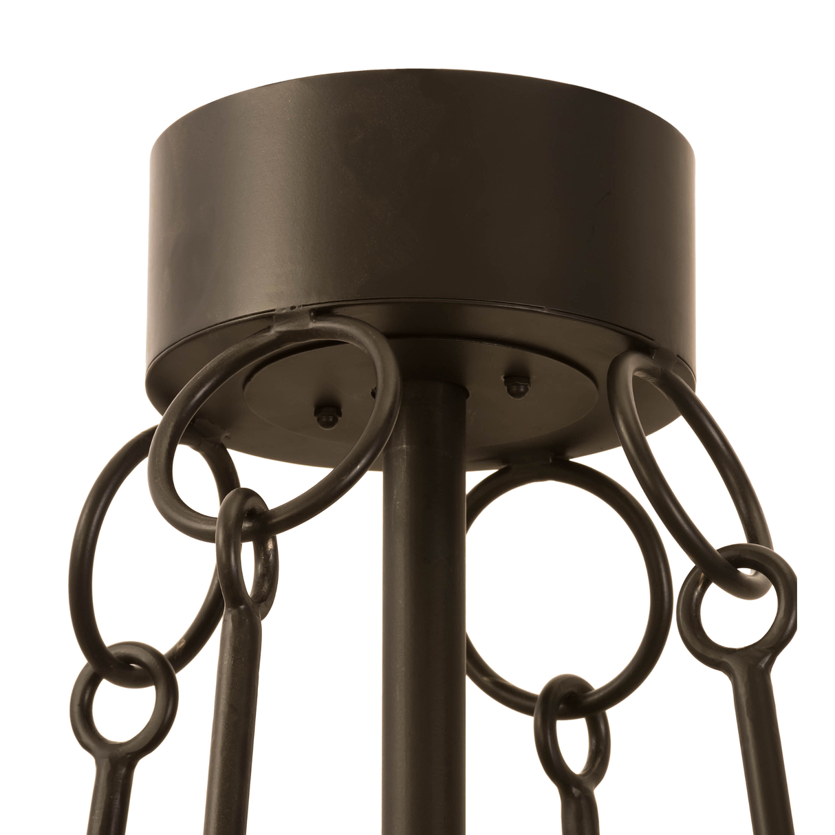 Canopy closeup showing black wrought iron rings and ceiling mount.