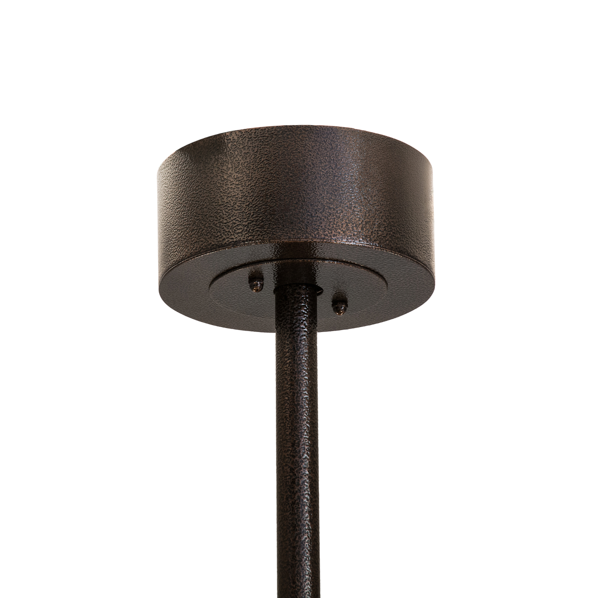 Unlit view focusing on the bronze canopy and suspension rod.