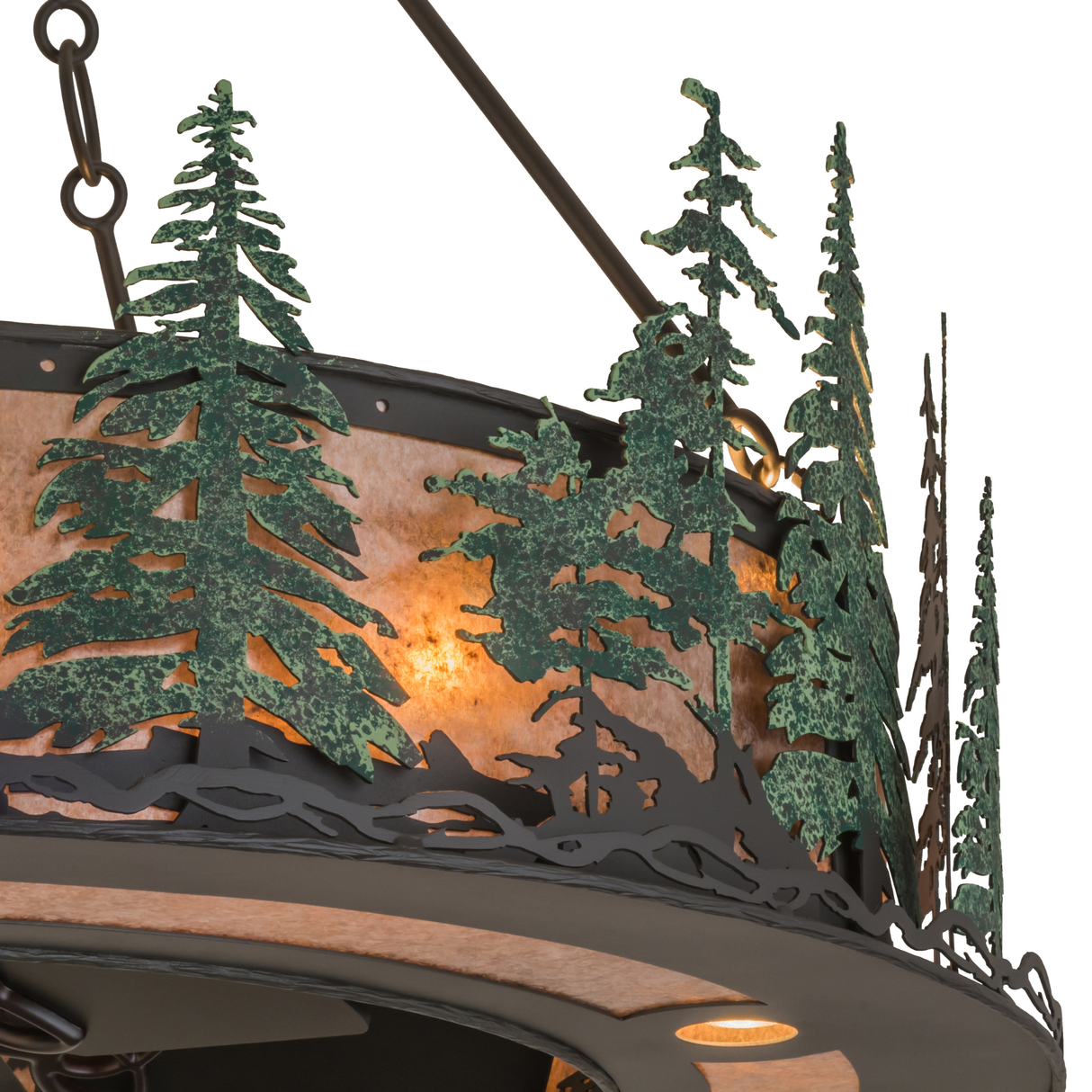 Closeup of green pine tree accents and warm mica panel texture.