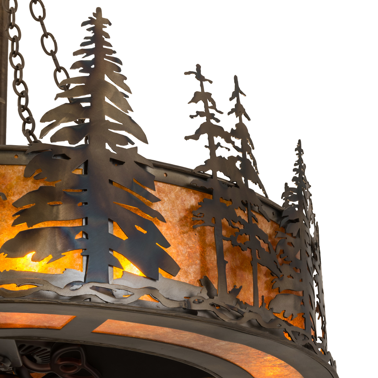 Close-up of pine tree silhouettes on Tall Pines Chandel-Air with warm lighting.