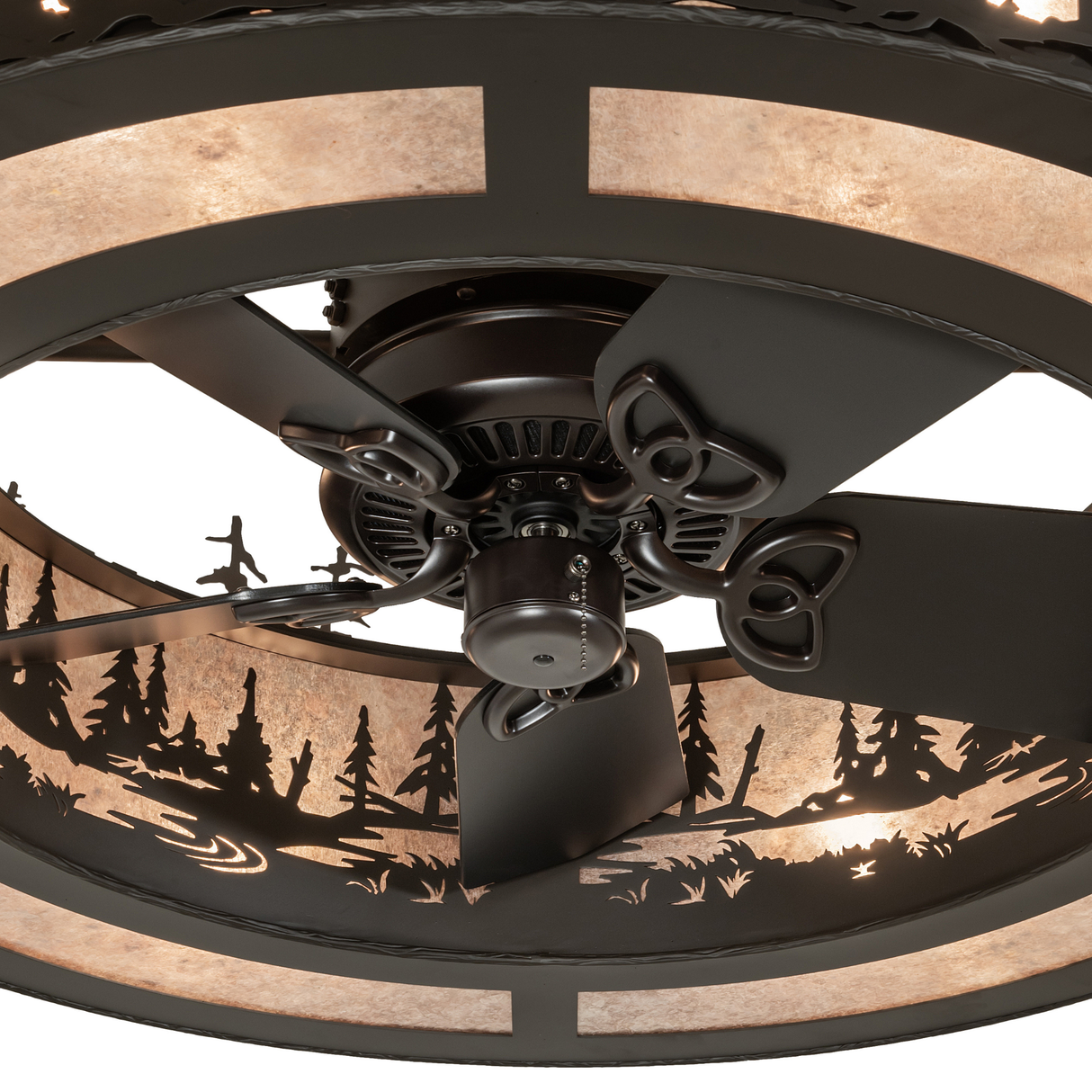Close-up view of integrated fan and Silver Mica shade with forest cutout detailing.
