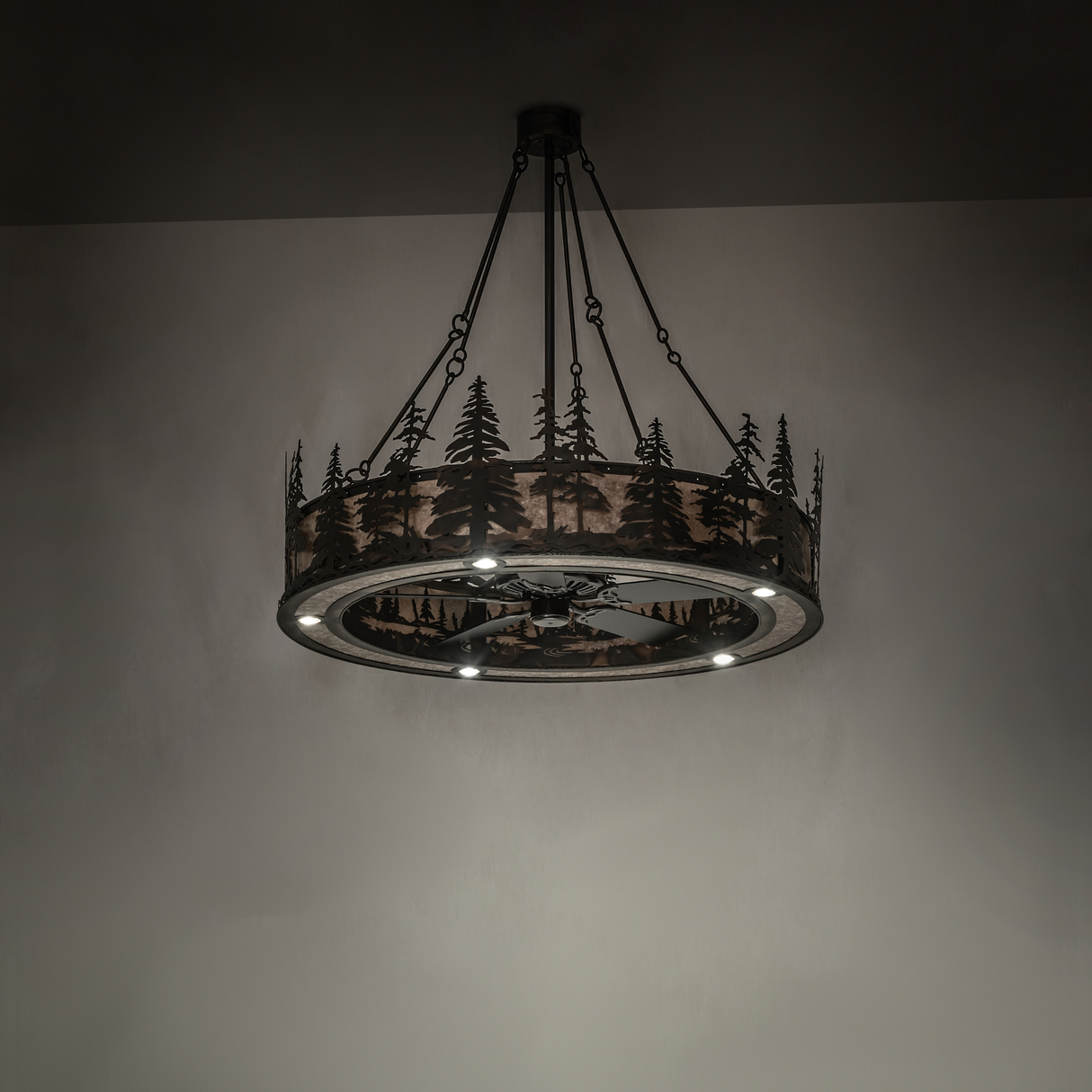 Soft light view highlighting pine tree silhouettes and bronze framework.