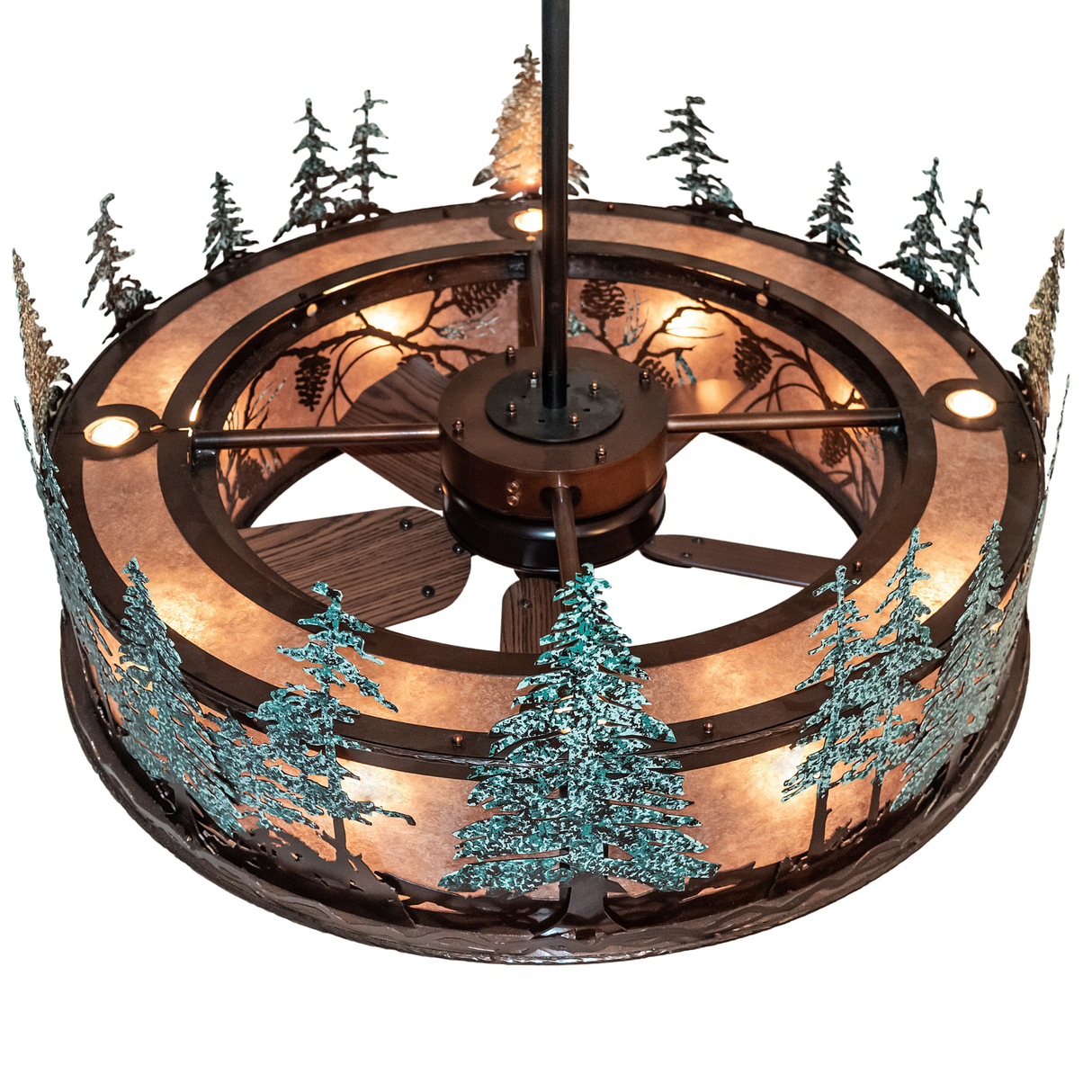 Angled top view showing light distribution and detailed pine tree silhouette.