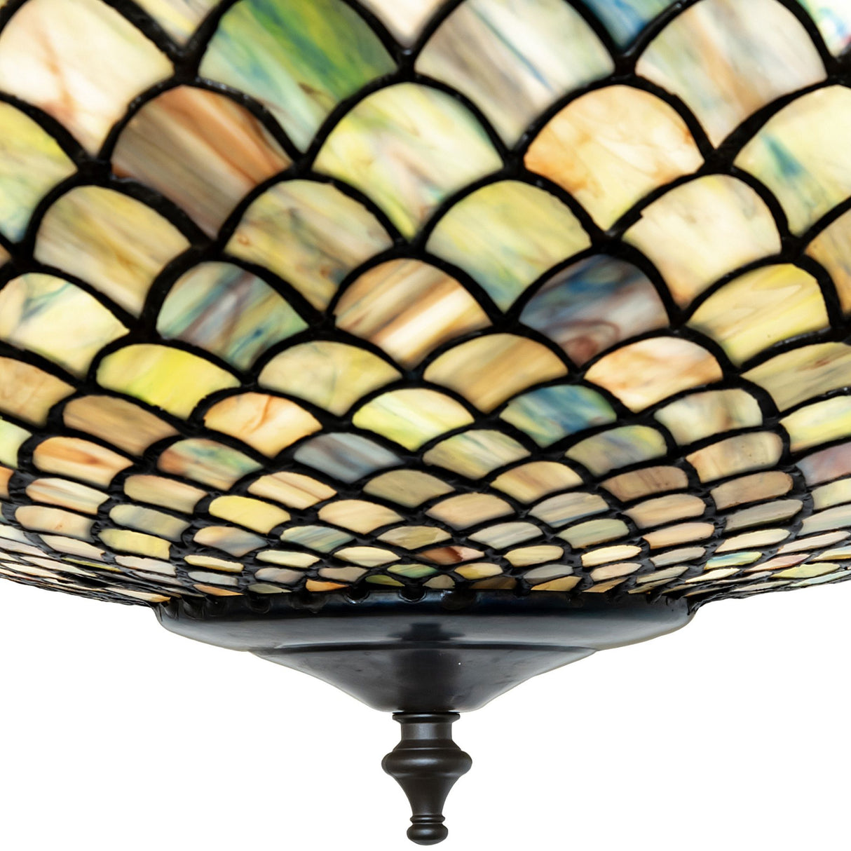 Detailed view of the finial on the Tiffany Fishscale semi-flushmount.