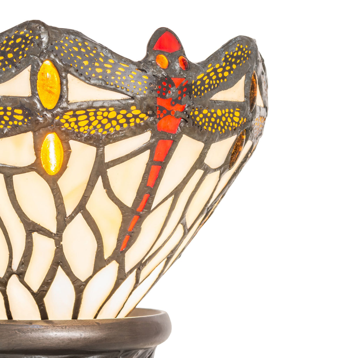 Close-up of intricate dragonfly stained glass pattern.