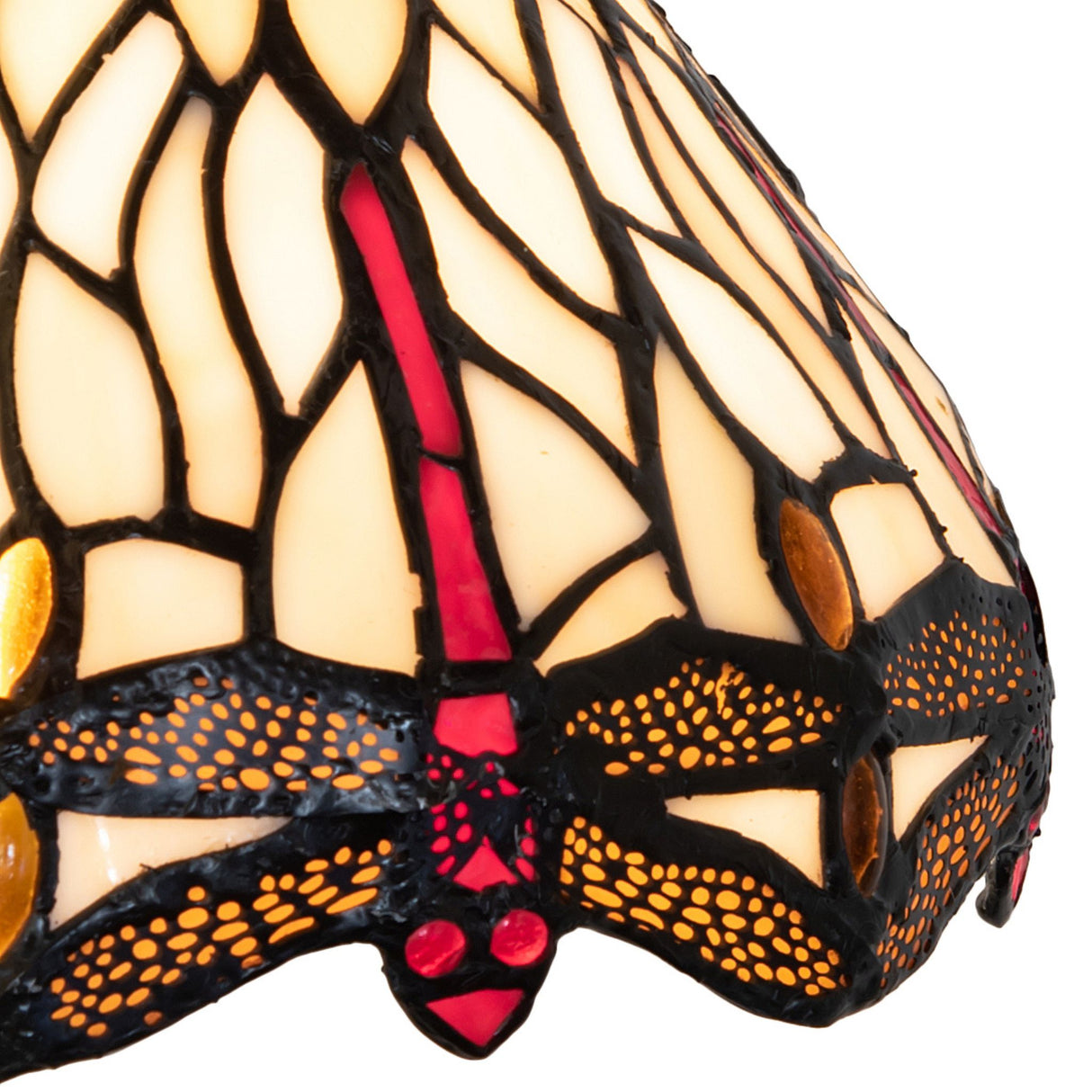 Close-up of the intricate dragonfly pattern on pendant shade.