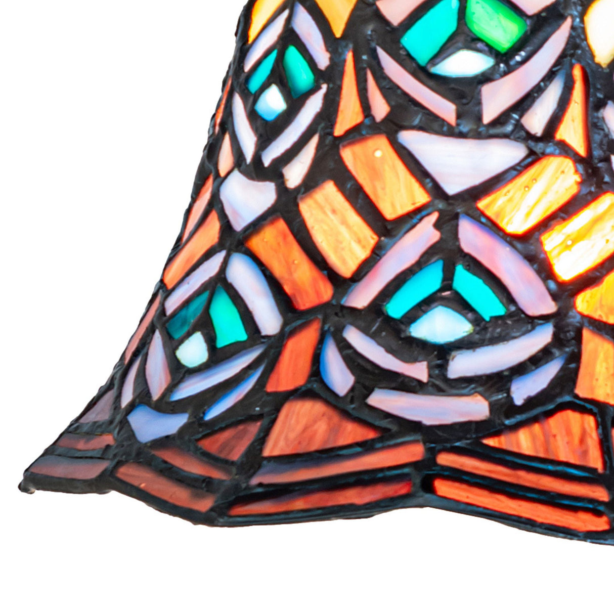 Unique peacock feather pattern in the flushmount's stained glass.