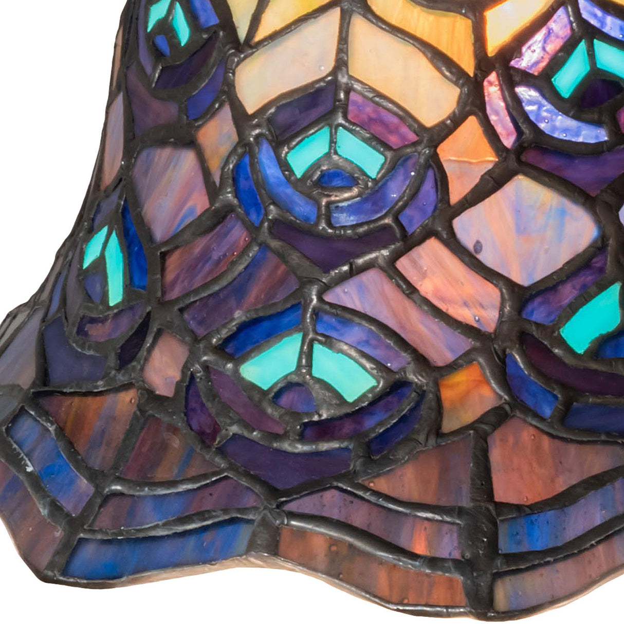 Close-up of intricate stained glass feather design.