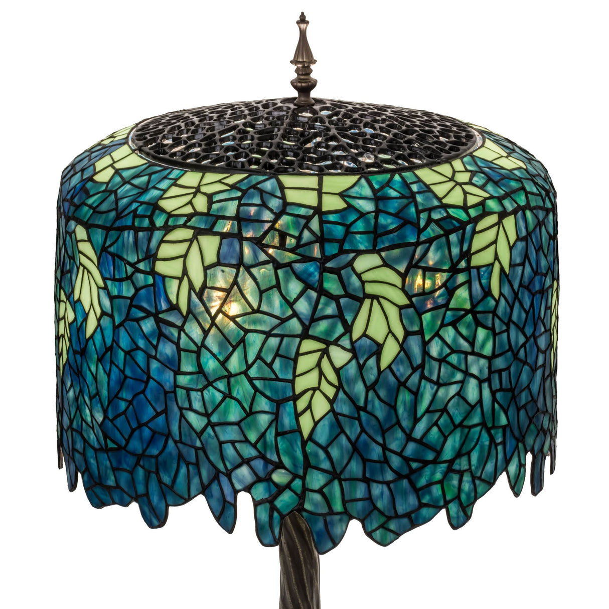 Closeup of the vibrant stained glass pattern on the Tiffany Wisteria lamp.