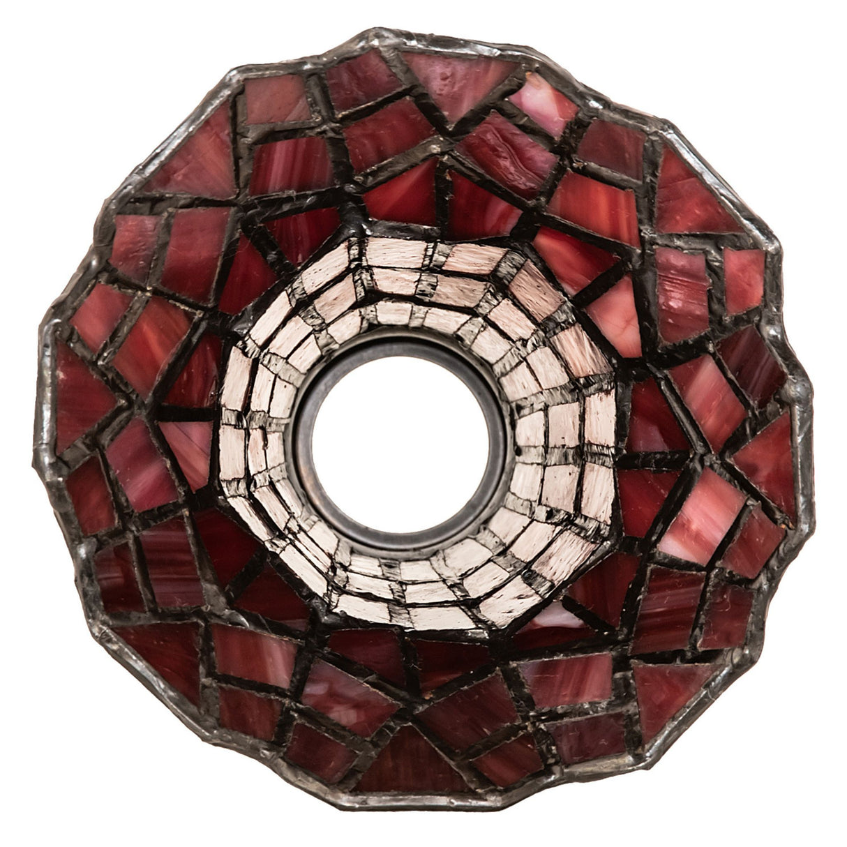 Top view of red stained glass pond lily shade with intricate geometric patterns.