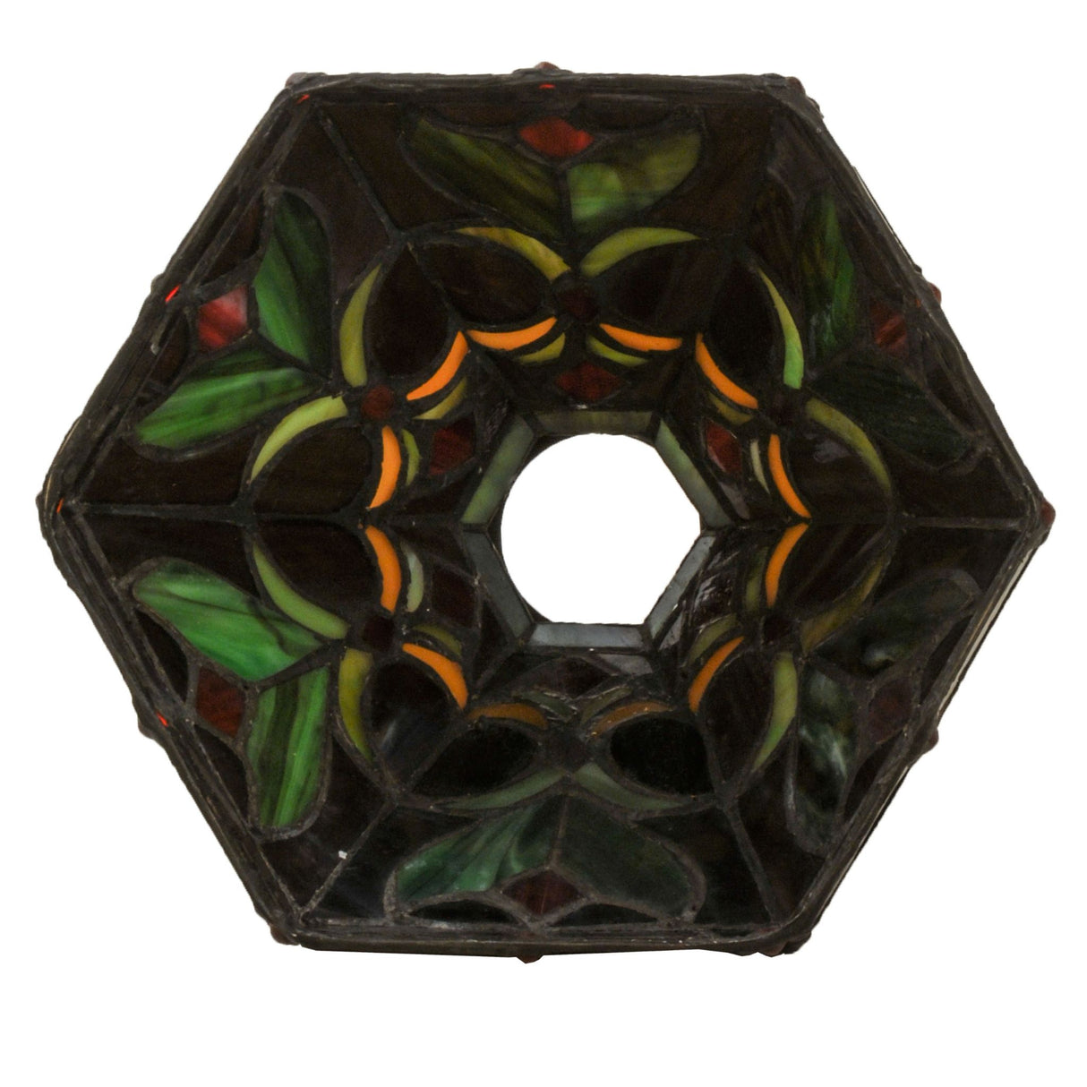 Top view of an octagonal stained glass lampshade with floral green and orange accents.