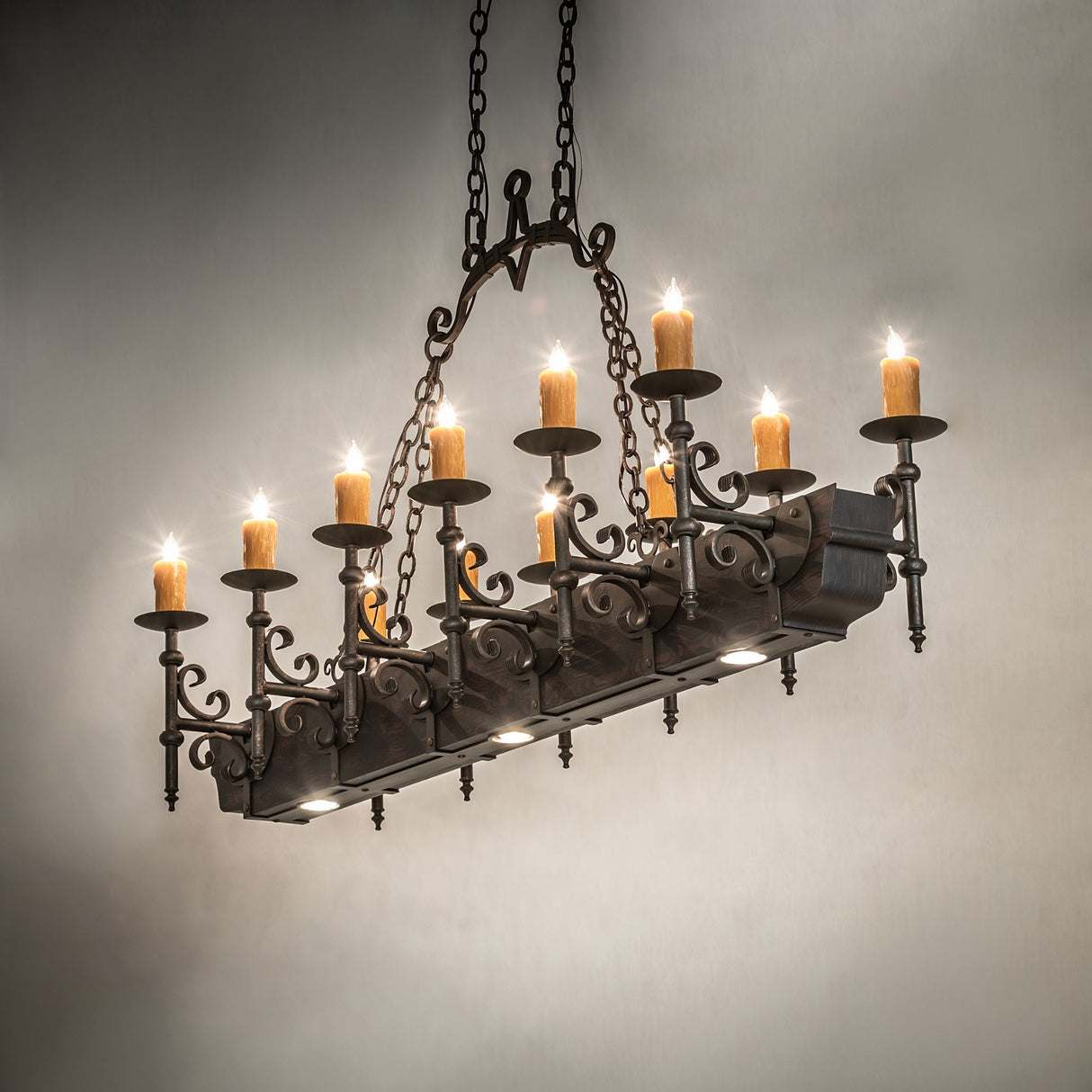 Ambient view showing Tudor oblong chandelier softly illuminating surrounding space.