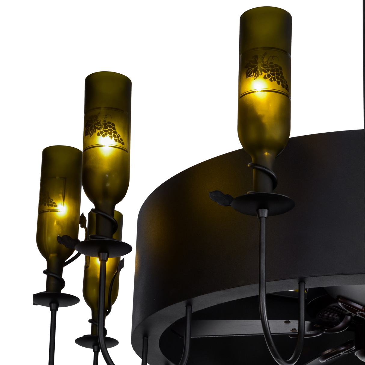 Closeup of side bottles with glowing etched grape motifs.