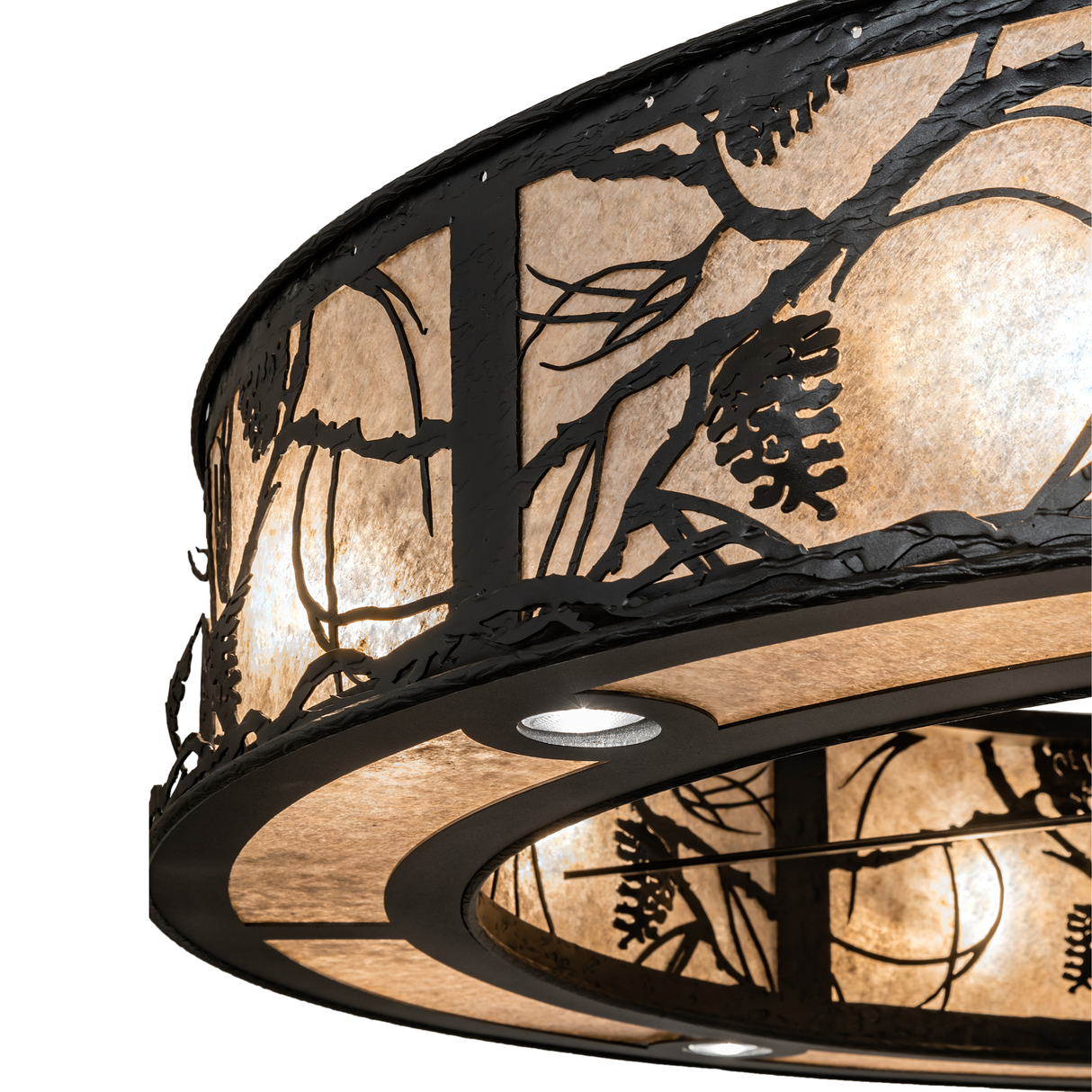 Close-up of integrated fan surrounded by illuminated mica and pinecone patterns.