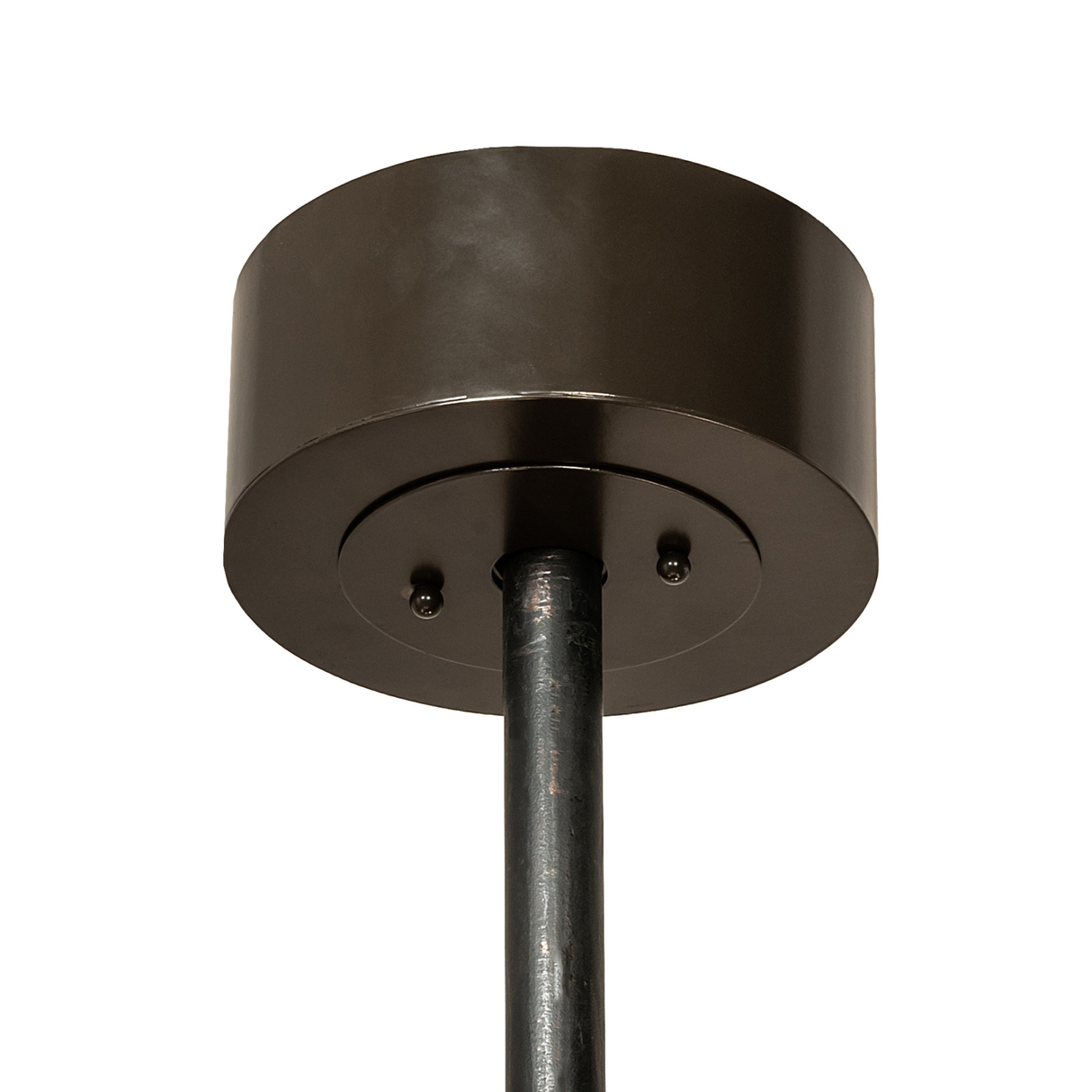 Close-up of ceiling canopy and bronze downrod mount.