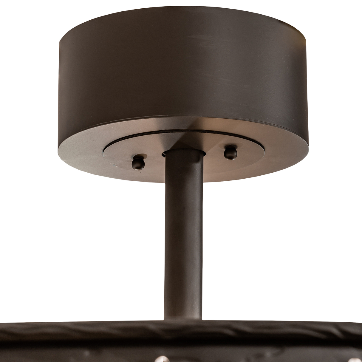 Closeup of Whispering Pines Chandel-Air ceiling canopy and downrod in Oil Rubbed Bronze finish.