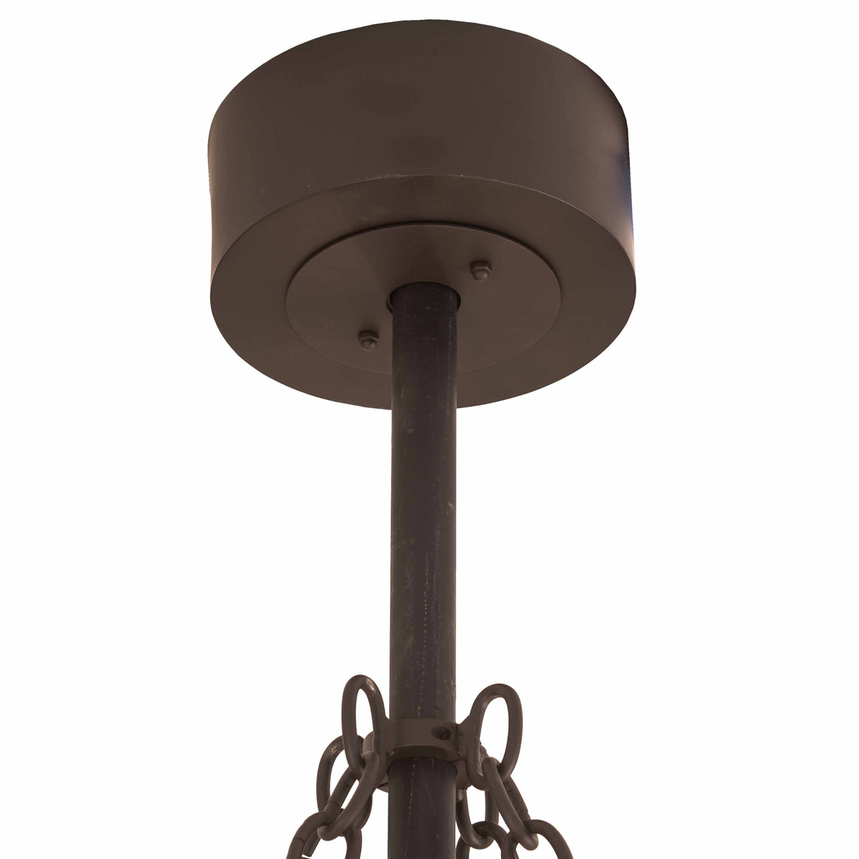 Close-up of round canopy and suspension chain in oil rubbed bronze finish.