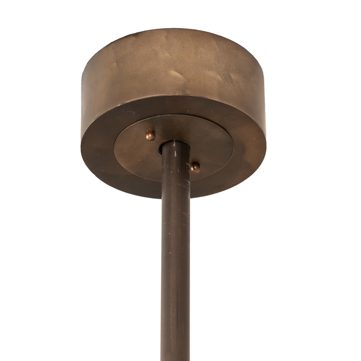 Close-up of ceiling canopy and downrod in warm antique bronze finish.