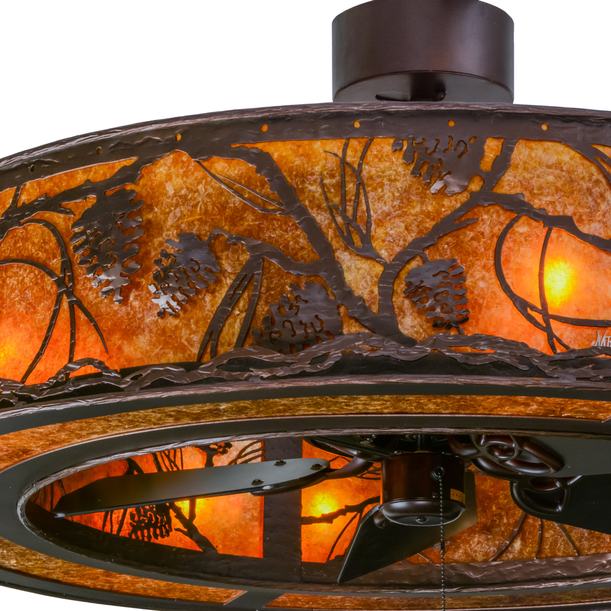 Closeup showing illuminated pinecone and branch design on mica shade.