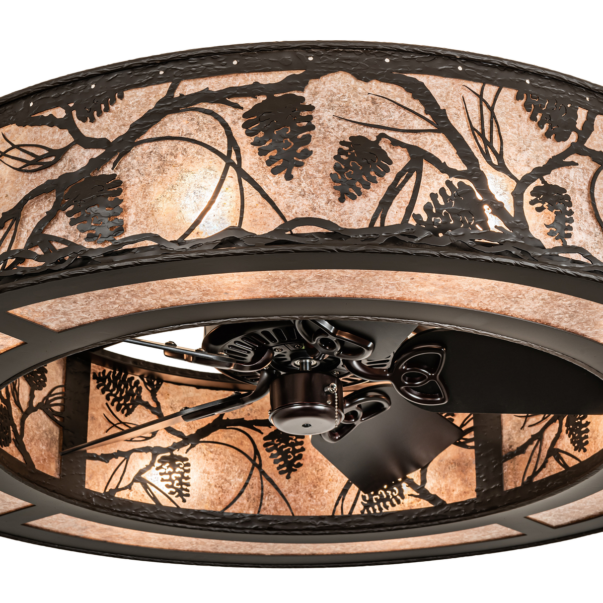Detailed close-up of Whispering Pines Chandel-Air with pinecone accents.