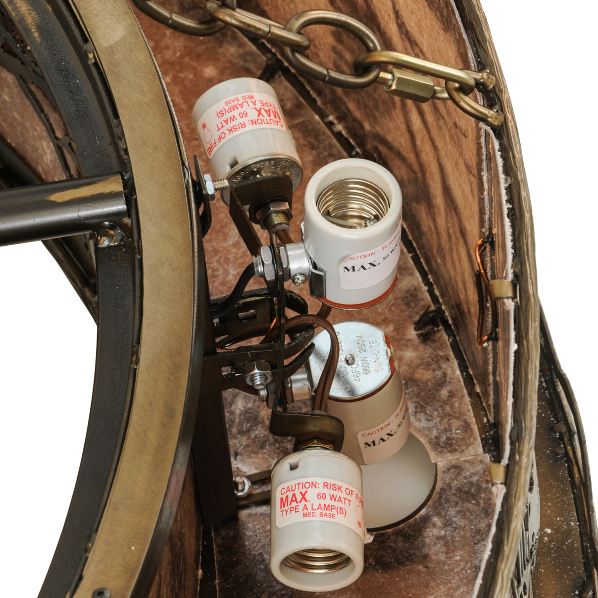 Closeup of internal light socket assembly and wiring inside mica housing.