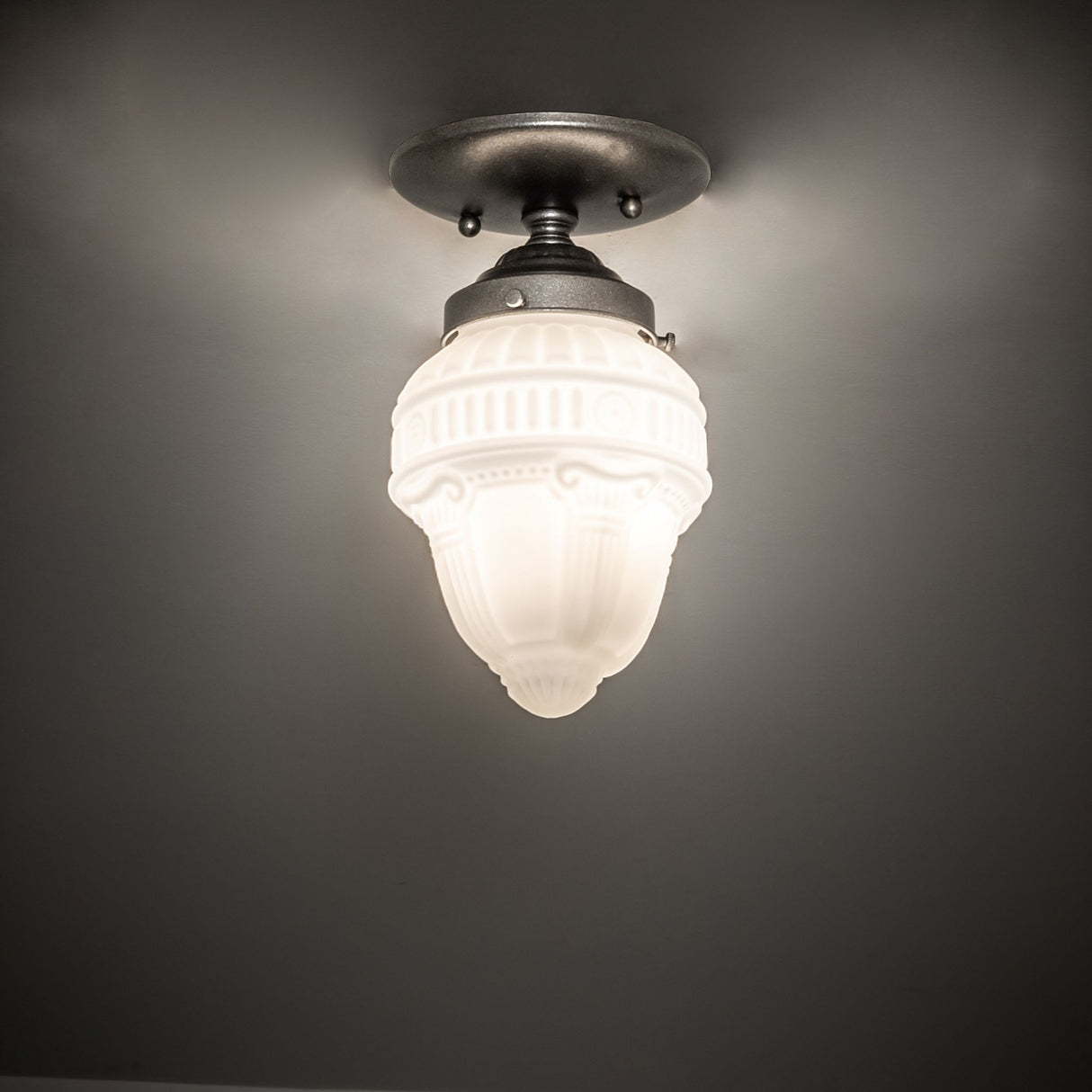 Illuminated Colonnade semi-flushmount installed on ceiling.